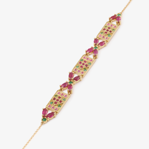 Bracelet Ava or jaune, rubis, émeraudes et saphirs roses profil.