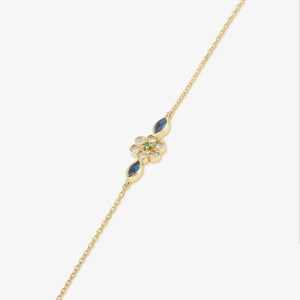 Bracelet Miniflower 1 bleu or jaune, diamants salt and pepper, saphirs bleus et émeraude profil